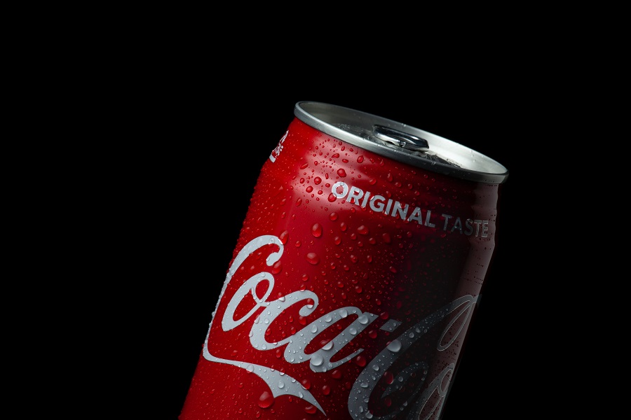 The iconinc branding of coca cola shown on a can